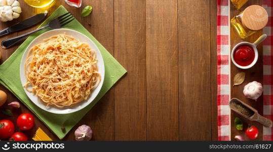 ready pasta on wooden background