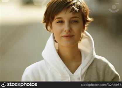 real beautiful girl on the street background, natural light