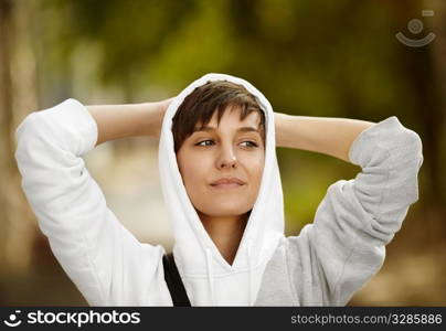 real beautiful girl on the summer green background, natural light