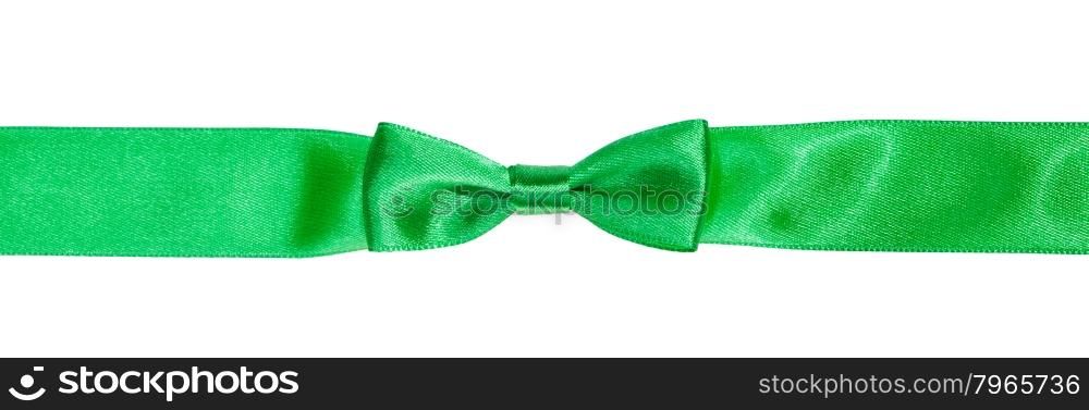 real bow knot on narrow green satin ribbon isolated on white background