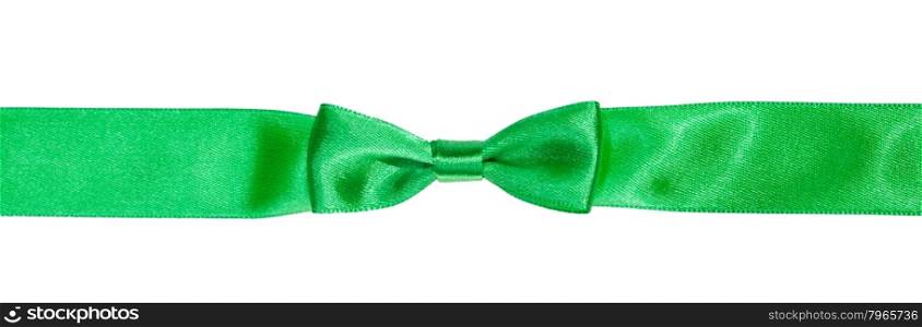 real bow knot on narrow green satin ribbon isolated on white background