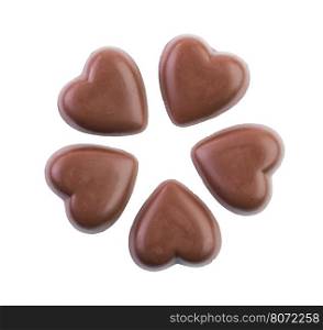 Real dark chocolate hearts isolated on a white background