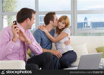 Real Estate Agent and Couple Buying Home