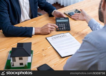 Real estate agent calculating tax and interest, insurance agreement terms with client buying property and applying for house loan. Financial advisor managing investment budget with calculator. Entity. Real estate agent calculating tax and interest with calculator. Entity