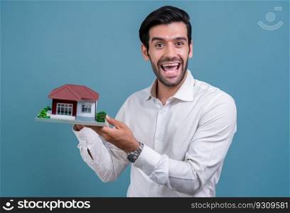 Real estate agent hold house model sample on isolated background. Housing business showcase with copy space. Realtor presenting property investment opportunity on house loan idea. Fervent. Real estate agent hold house model sample on isolated background. Fervent