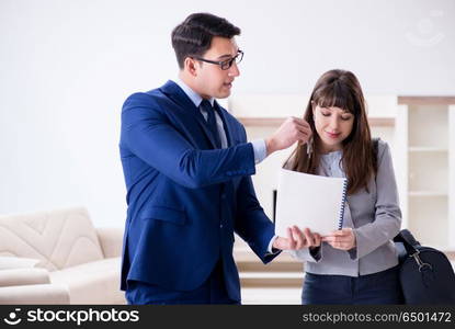 Real estate agent showing new apartment to owner