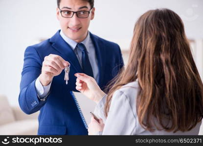 Real estate agent showing new apartment to owner