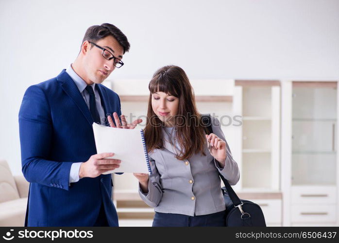 Real estate agent showing new apartment to owner