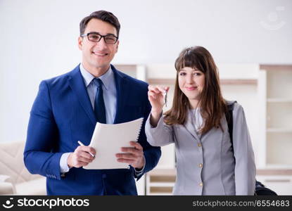 Real estate agent showing new apartment to owner