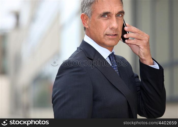 Real estate promoter on phone