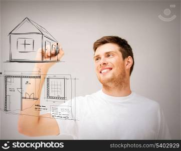 real estate, technology and accomodation concept - man drawing house and blueprint on virtual screen