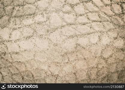 Real leather background, closeup of genuine leather. Backdrop background texture effect for design. Artificial eco leather closeup.