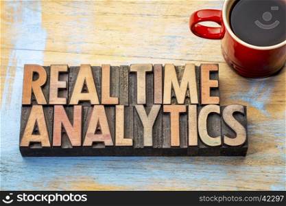 real time analytics word abstract in vintage letterpress wood type