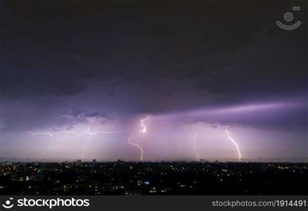 Realistic lightning in city at night background. Electricity. Natural light effect, bright glowing. Thunder
