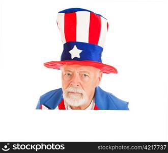 Realistic Uncle Sam head peering over white space. Isolated design element.