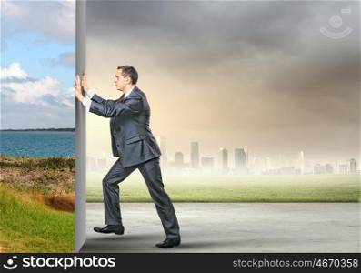 Reality change. Image of young business man changing reality