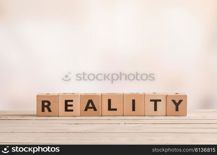 Reality sign on a table of wood in a room