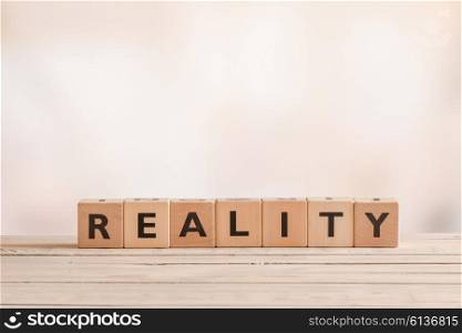 Reality sign on a table of wood in a room
