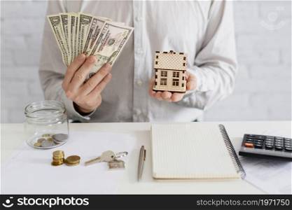 realtor money wooden house. High resolution photo. realtor money wooden house. High quality photo