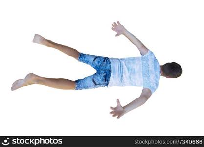 Rear view full length portrait of a young man free falling down hands and legs stretched isolated over white background.