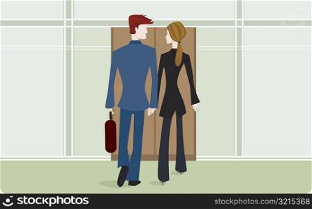 Rear view of a businessman and a businesswoman holding hands and walking