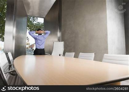 Rear view of a businessman in a conference room