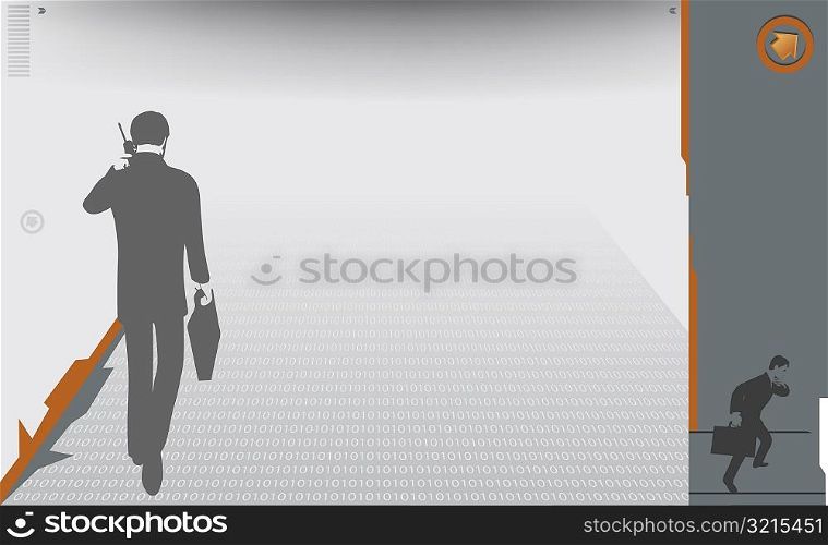 Rear view of a businessman talking on a mobile phone while walking