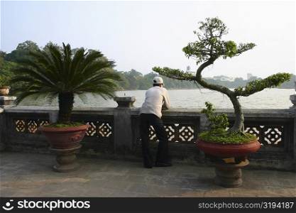 Rear view of a man looking at view, Hanoi, Vietnam