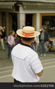 Rear view of a man standing