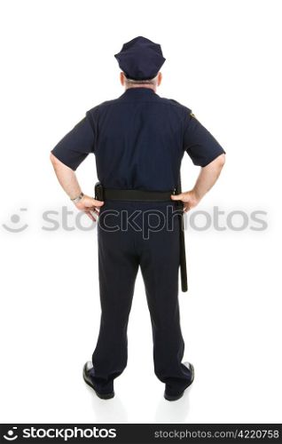 Rear view of a mature police officer in uniform. Full body isolated on white.