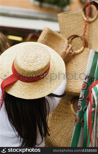 Rear view of a woman at a market stall