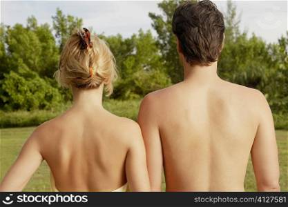 Rear view of a young couple standing