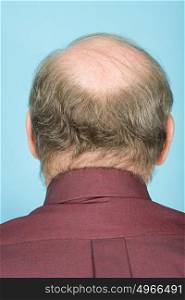 Rear view of balding man