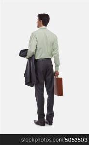 Rear view of businessman with suitcase