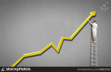 Rear view of businesswoman standing on ladder and reaching increasing graph. Climbing success ladder