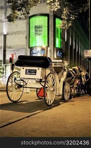 Rear view of horse carriages in front of a building, Michigan Avenue, Chicago, Illinois, USA