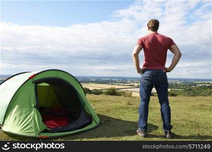 Rear View Of Man Camping And Admiring View