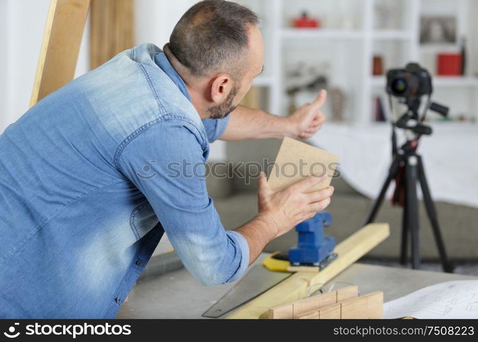 rear view of man making carpentry blog