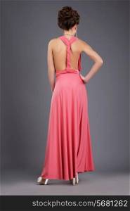 Rear View of Shapely Lady in Evening Gown