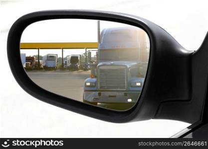 rearview car driving mirror overtaking big truck lorry