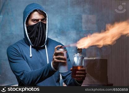 Rebel with molotov cocktail in dark room