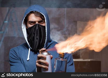 Rebel with molotov cocktail in dark room