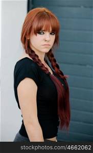 Rebellious teenager girl with red hair very angry