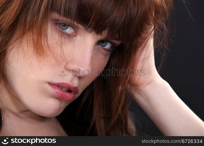 Rebellious woman with unkempt hair