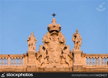 Reccared II and Liuva II, Visigoth kings, flanking the Arms of Spain, top of the Royal Palace facade (east side) architectural detail in Madrid, Spain