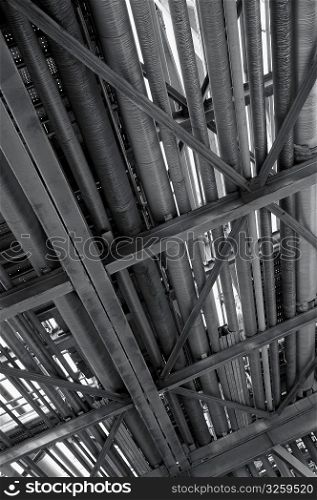 Receding piping at an oil and gas refinery.