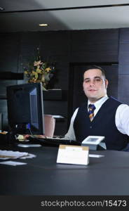 reception service man hotel indoor smile travel