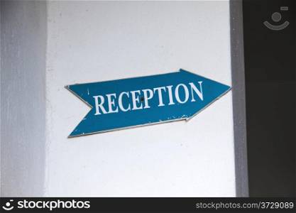 Reception Sign closeup on the wall
