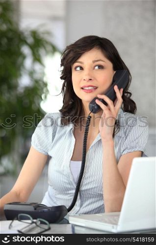 Receptionist answering the telephone