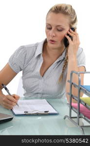 Receptionist making telephone call